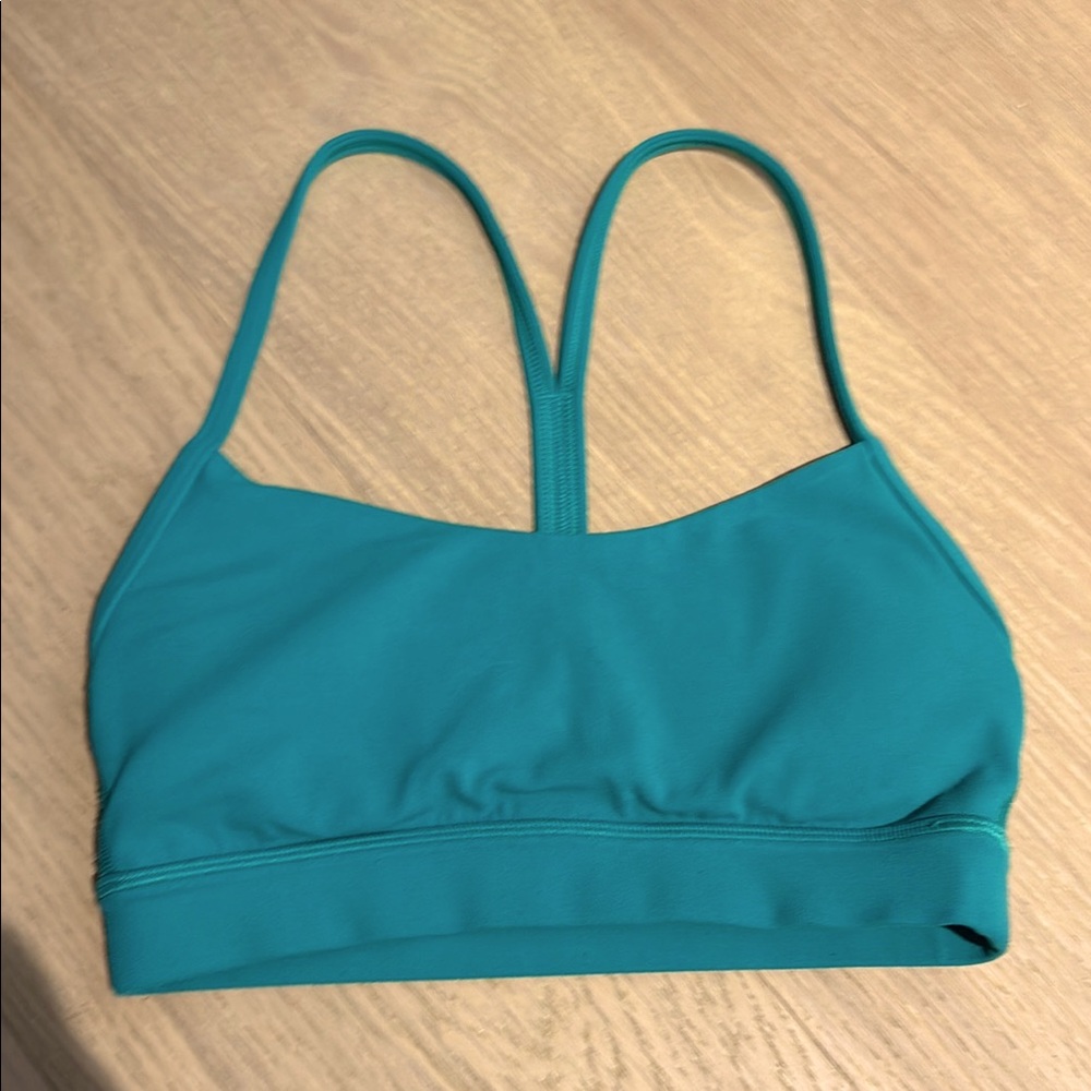 Lululemon Athletica Sports Bra size 2 green teal colored Flow Y Nulu 
Style